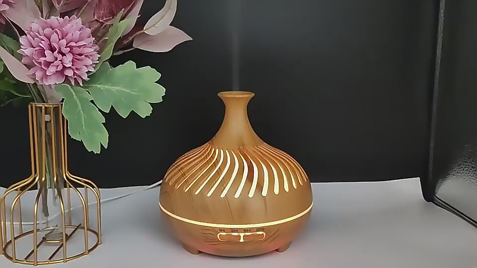 دیفیوزر آروماتراپی ۵۰۰ میلی‌لیتر با کنترل از راه دور و ۷ نور ال ای دی – تایمر، خاموشی خودکار و کارکرد بی‌صدا